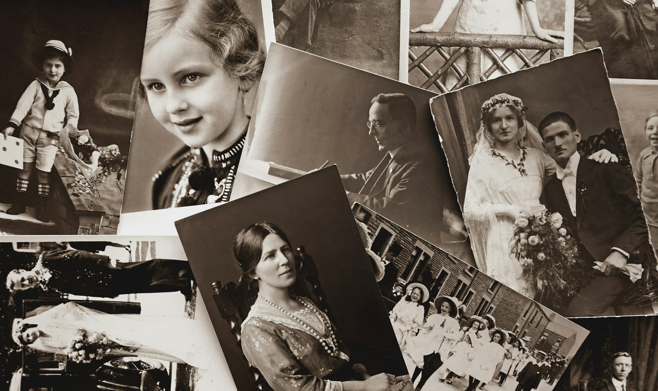 A nostalgic collection of vintage black and white family photographs, showcasing historical memories.
